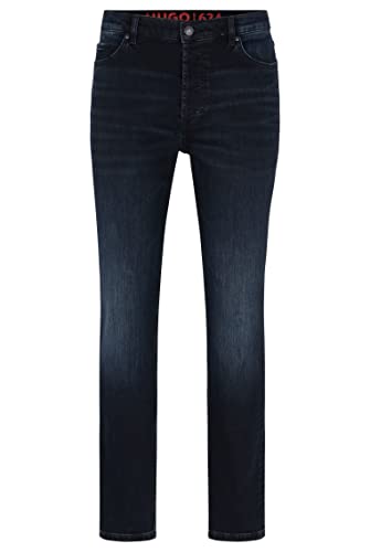 HUGO Herren 634 Tapered-Fit Jeans aus blauschwarzem Stretch-Denim Dunkelblau 33/34 von HUGO