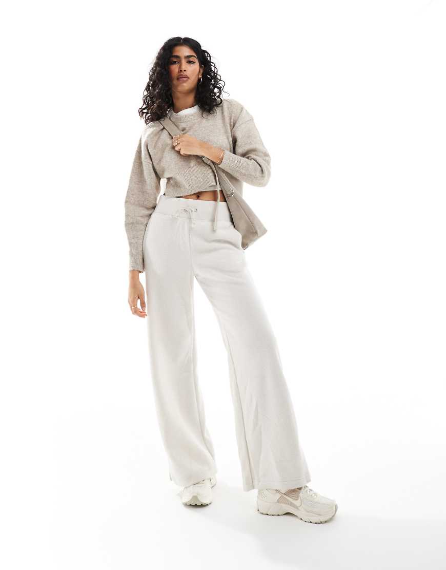 Nike - Phoenix Fleece - Jogginghose in Beige mit weitem Bein-Neutral Nike - Phoenix Fleece - Jogginghose in Beige mit weitem Bein-Neutral von Nike