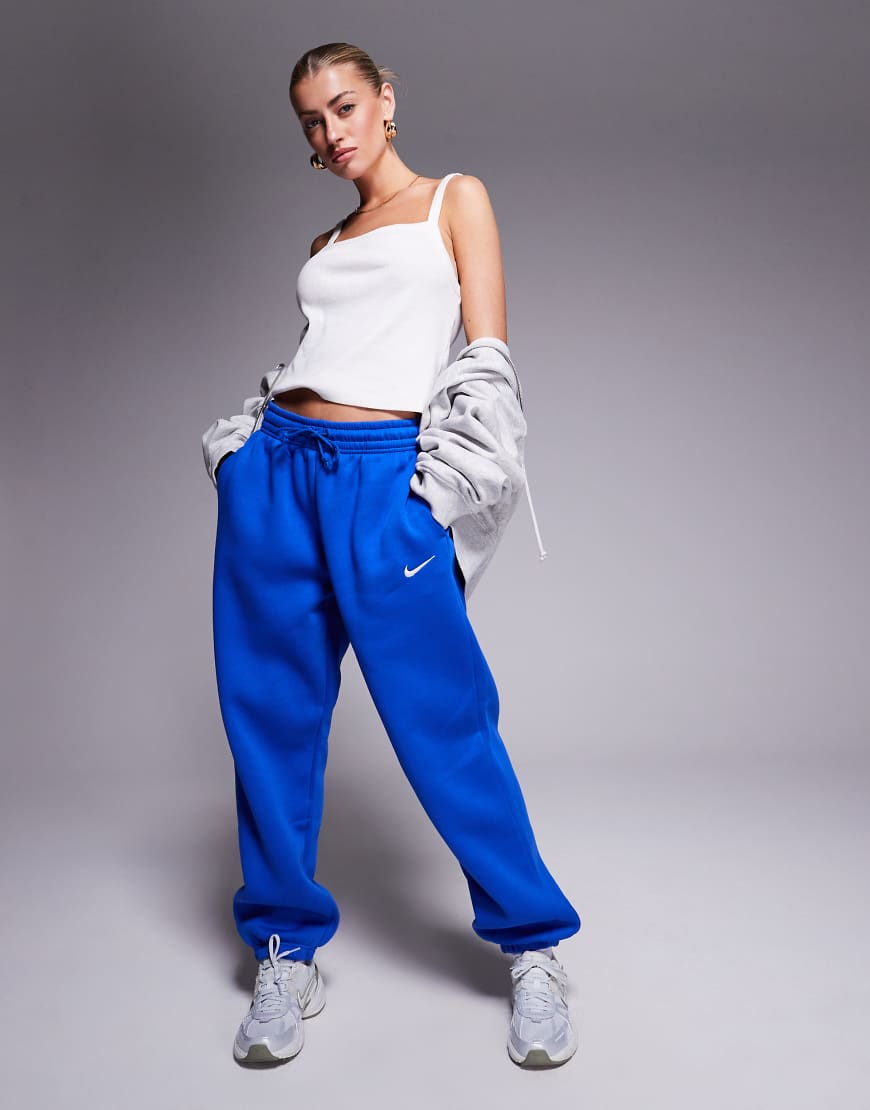 Nike - Phoenix Fleece - Oversize-Jogginghose in Königsblau mit hohem Bund Nike - Phoenix Fleece - Oversize-Jogginghose in Königsblau mit hohem Bund von Nike