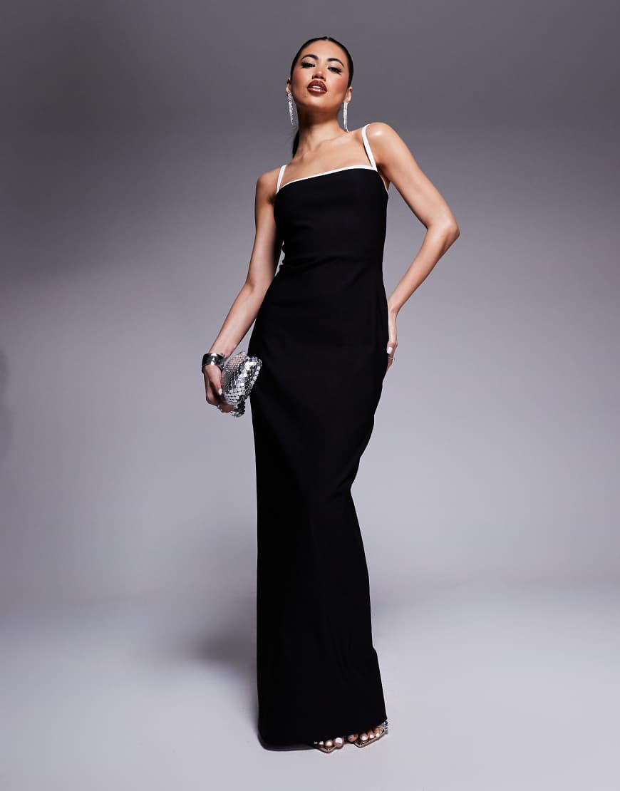 Vesper - Figurbetontes Maxikleid in Schwarz mit eckigem Ausschnitt und farblich abgesetzter Paspelierung Vesper - Figurbetontes Maxikleid in Schwarz mit eckigem Ausschnitt und farblich abgesetzter Paspelierung von Vesper